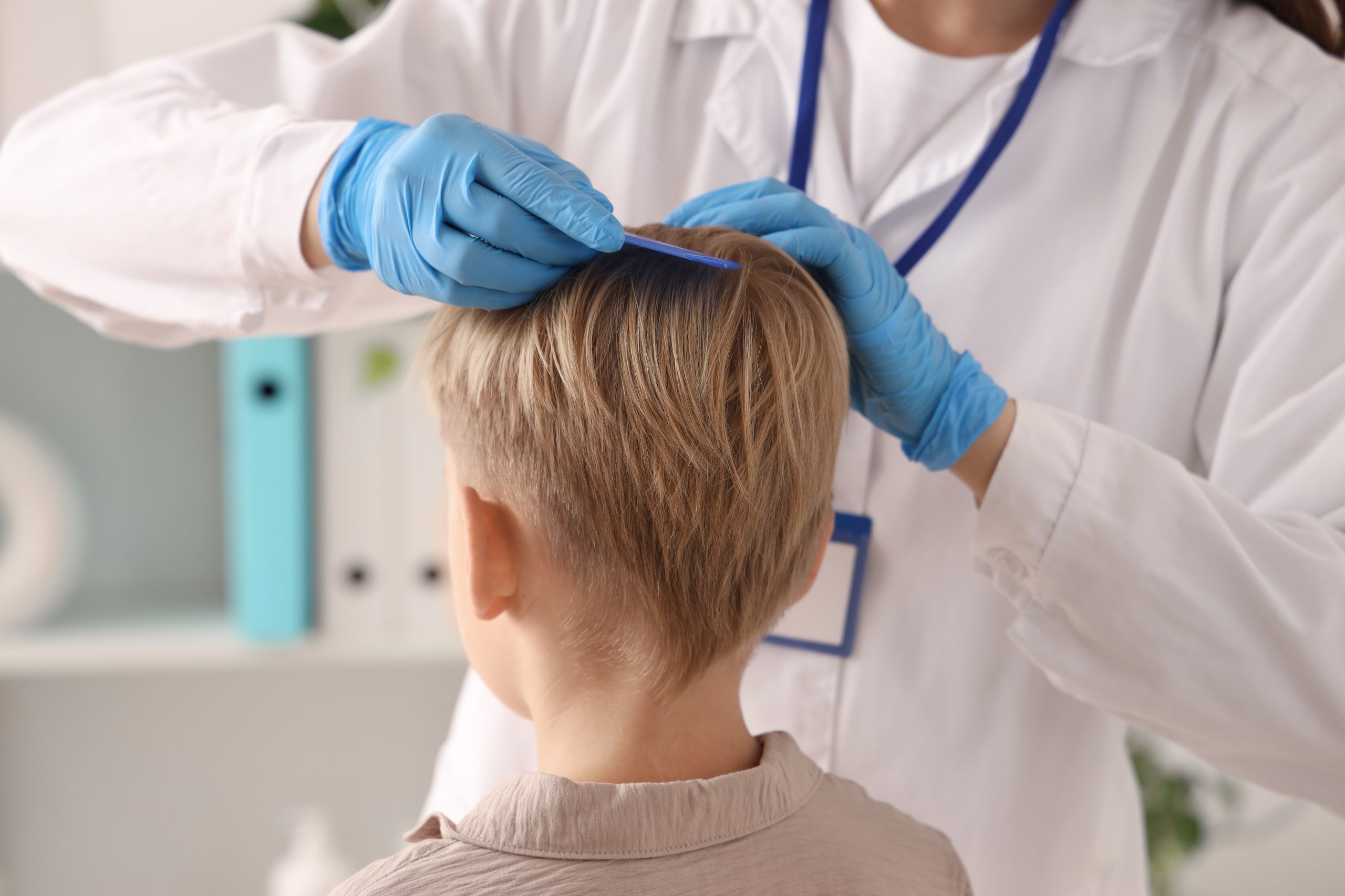 Pediatric head lice examination, child hair health, medical screening, doctor patient interaction, healthcare and hygiene